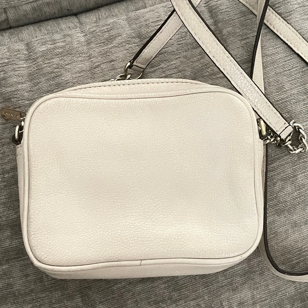 Michael kors cross body creme bag